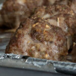 cooked meatballs on a pan