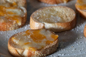 Cheese toast using reflective umbrella close up