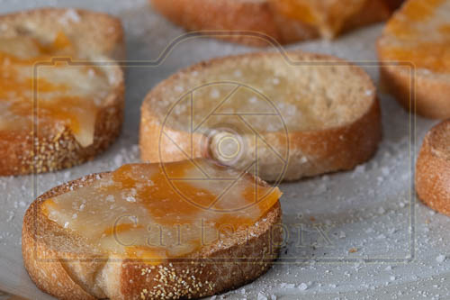 Cheese toast using white umbrella close up