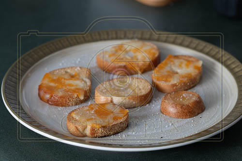 Cheese toast using white umbrella