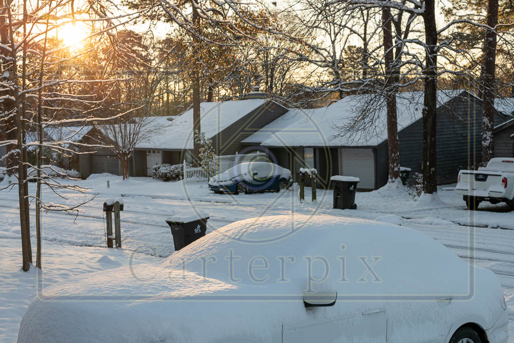 Day after snow, morning. Car and street