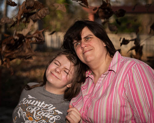 Portrait of mother and daughter in the fall colors