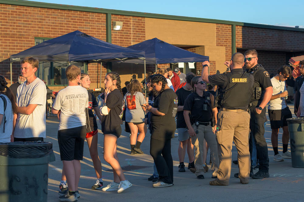 Sheriffs chat and oversee band kids at competition